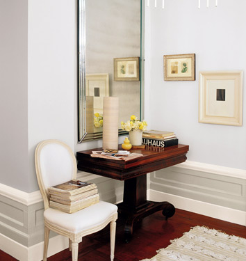 White Walls with White Chair and Mahogany Pedestal Table